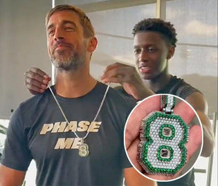  Sauce Gardner Welcomes Aaron Rodgers to NY Jets With Some High-Flying Bling - Diamond Designs