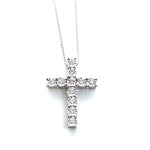 Diamond Designs .27ct White 14 Karat Gold Diamond Cross Pendant *