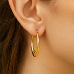14K Yellow Gold Puffed Graduated Open Oval Earrings, view 4