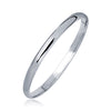 14k White Gold Dome Childrens Bangle with a Polished Finish (5.50 mm)