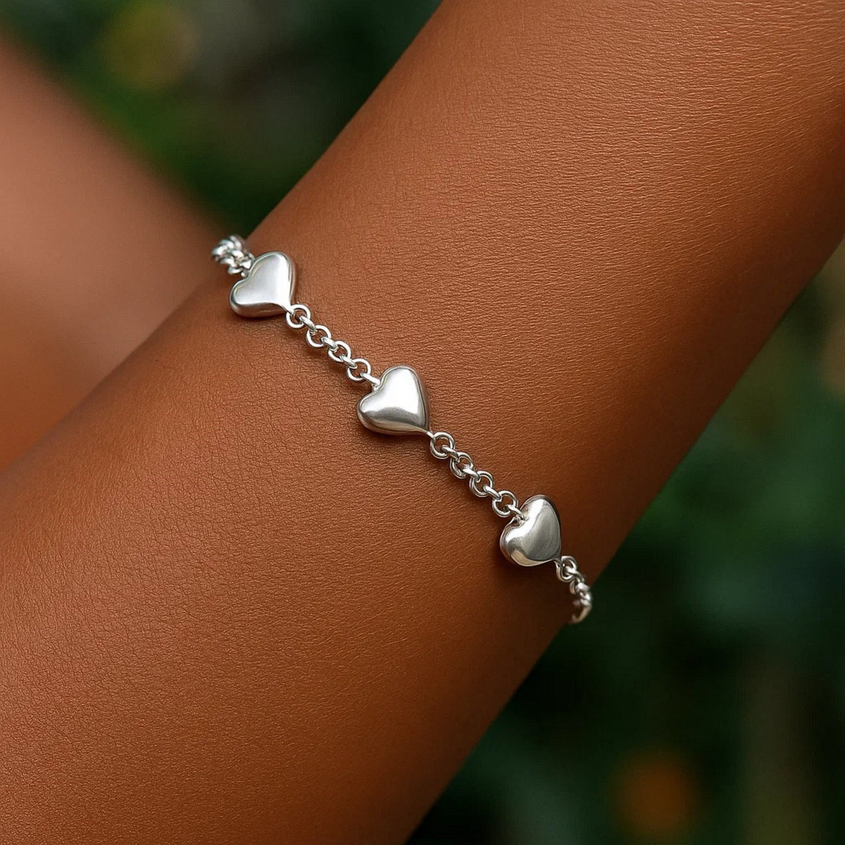 Sterling Silver Rhodium Plated Puffed Triple Heart Bracelet, view 5