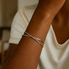 Sterling Silver Rhodium Plated Slip On Cross Over Bangle (11.10 mm), view 5
