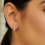 14K Yellow Gold Pearl Huggie Earrings, view 3