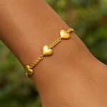 Sterling Silver Yellow Gold Plated Extra Puffed Triple Heart Bracelet, view 5