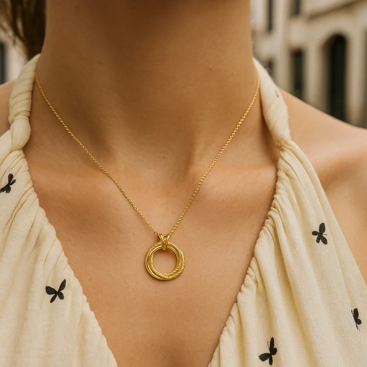 14K Yellow Gold Interlocking Diamond Cut Trinity Necklace, view 3