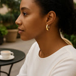 Medium Tapered Hoop Earrings in 14K Yellow Gold, view 4