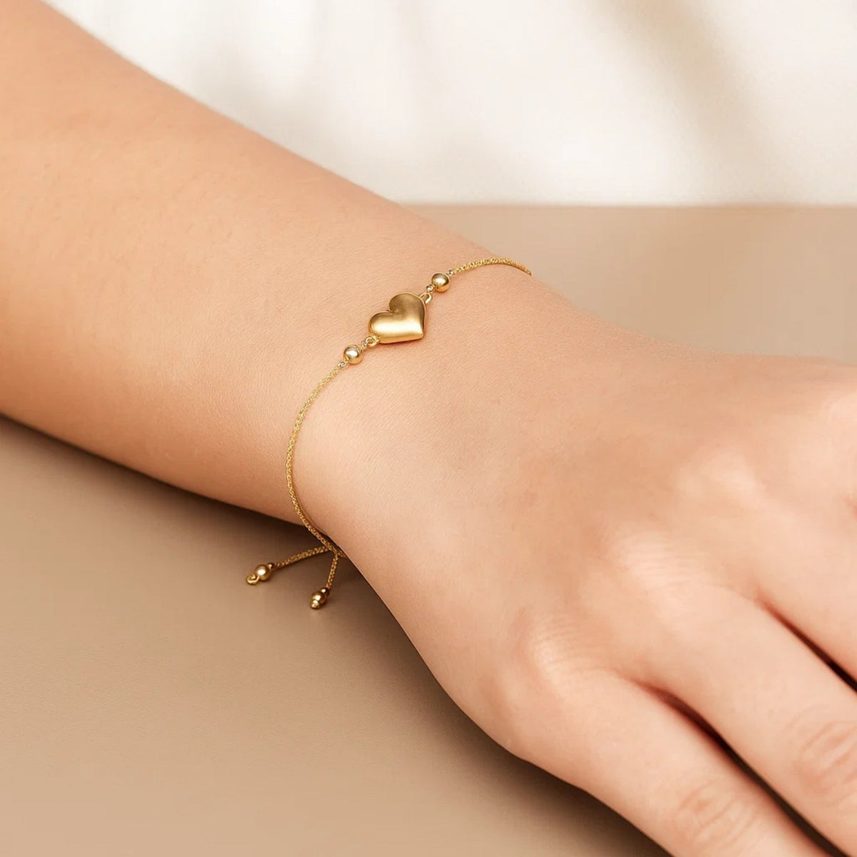 Adjustable Puffed Heart Draw String Bracelet in 14K Yellow Gold, view 3