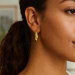 14K Yellow Gold Graduated Oval Hoop Earrings, view 3