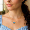14K Yellow Gold Emerald Cut Blue Topaz Necklace, view 4