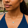 14K Yellow Gold Emerald Cut Blue Topaz Necklace, view 5