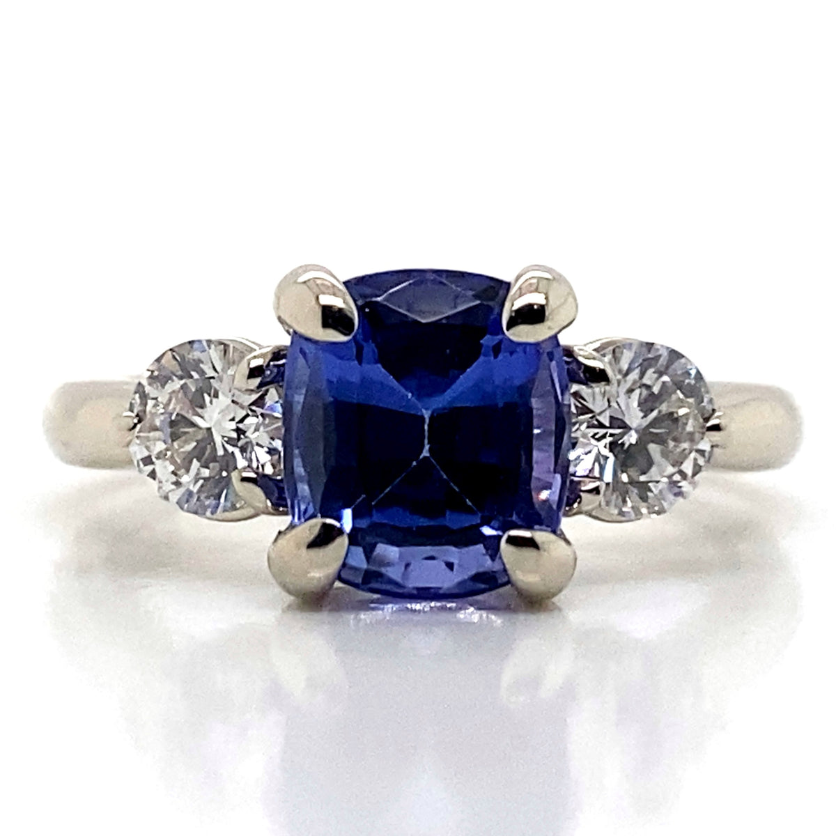 Diamond Designs White 18 Karat Gold Tanzanite 3 Stone Ring *
