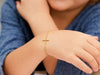14k Yellow Gold 5 1/2 inch Childrens Bracelet with Cross (1.00 mm)