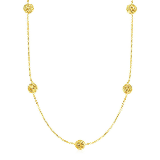 Station Necklace with Polished Love Knots in Yellow Gold