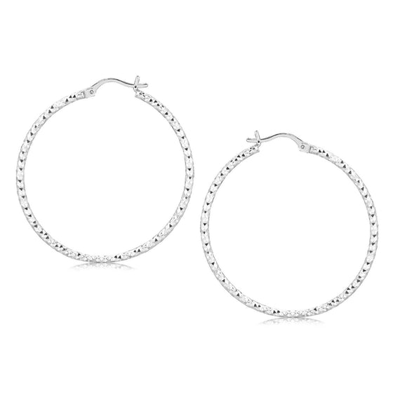 Sterling Silver Rhodium Plated Large Faceted Style Hoop Earrings - Diamond Designs